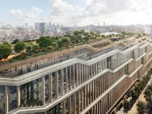 Google's King's Cross landscraper with its rooftop garden and the London skyline beyond.