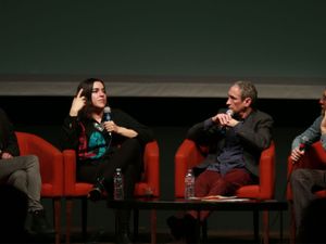 Josette Melchor on stage in conversation with Douglas Rushkoff and Erik Davis for Team Human.